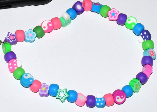 Fun and Colorful Yin and Yang Flowery Phone Charm